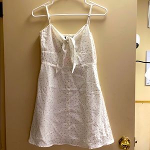 Kittenish White Dress with Front Tie